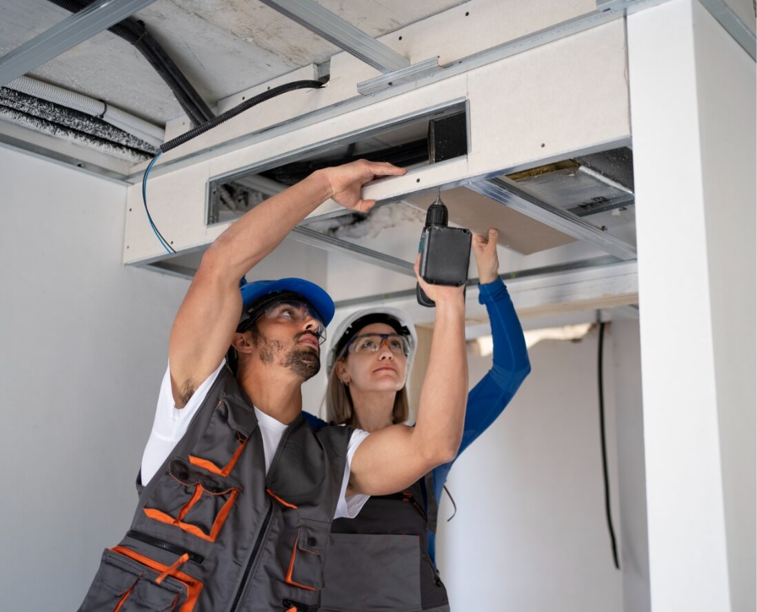 Electrician completing Switchboard Upgrades Brisbane, installing new RCBOs and labelling circuits.